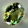 0.48 carat natural demantoid garnet from Namibia, light bright green color, beautiful clarity, and brilliance.