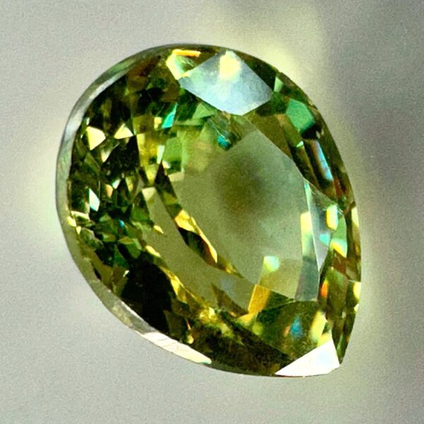 0.43 carat natural demantoid garnet from Namibia, Light bright green color, and beautiful clarity