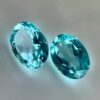 Pair of 1.99 carat blue Paraiba-type apatites, oval cut, vibrant turquoise blue and brilliant appearance.